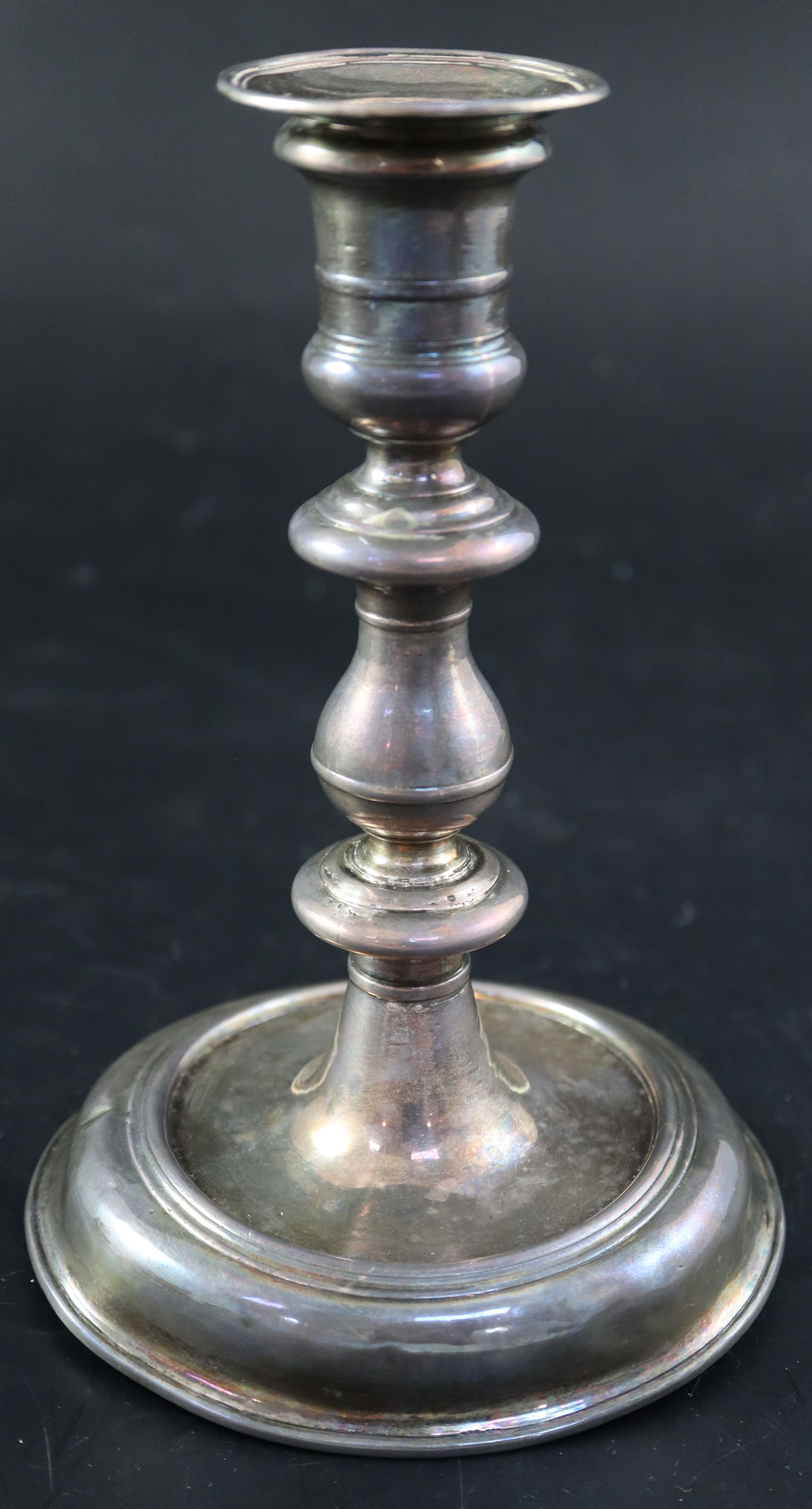 A Queen Anne silver candlestick, 19cm, 14.5oz.